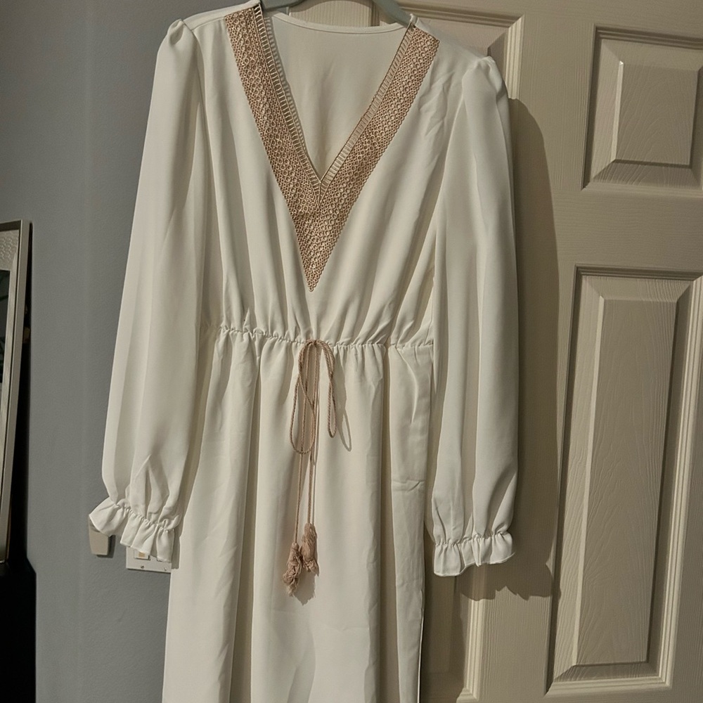Elegant White Dress with Crochet Type Detail
